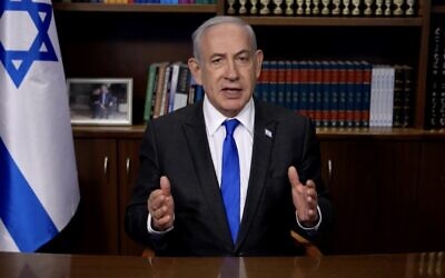 Le Premier ministre Benjamin Netanyahu prononçant un discours vidéo concernant d’éventuels mandats d'arrêt que la CPI émettrait contre des responsables israéliens, le 30 avril 2024. (Crédit : Capture d'écran/GPO)