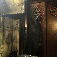 L'intérieur de la synagogue à Rouen qu'un homme a tenté d'incendier, le 17 mai 2024. L'homme a été abattu par la police française. (Crédit : AP)