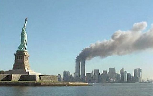 The Twin Towers burning on a beautiful September day in New York City
Photo Credit: By National Park Service (http://www.nps.gov/remembrance/statue/index.html) [Public domain], via Wikimedia Commons