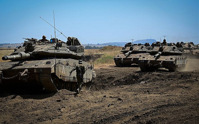 Soldats israéliens se préparant à descendre vers le sud le 11 mai 2021, El Poran, plateau du Golan. Photo de Michael Giladi/Flash90