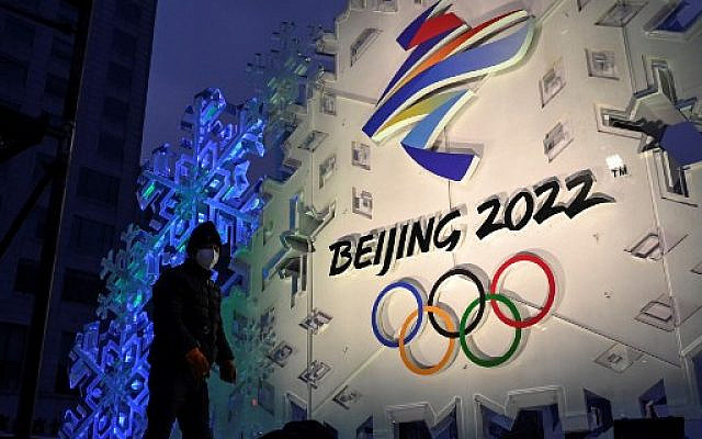 Logo des Jeux Olympiques d'hiver de Pékin 2022 dans une rue de Pékin le 21 janvier 2022.
JADE GAO / AFP