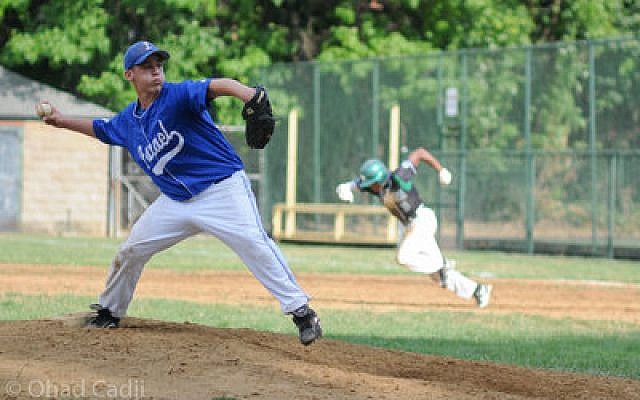 Yehuda Joffe, age 16, from Bet Shemesh, Israel, delivers pitch as an Allderdice baserunner breaks for second. (Chronicle photo by Ohad Cadji)