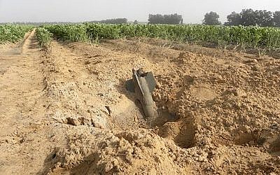 A Gaza rocket in an Eshkol Regional Council field during the latest conflict. (Credit: Ronit Minaker)