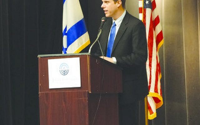 Elad Strohmayer addresses a pro-Israel rally at the Jewish Community Center of Greater Pittsburgh. The Israeli Deputy Consul General for the Mid-Atlantic Region made his first visit to Pittsburgh last week, meeting with community leaders and the media. (Amy Cohen photo)