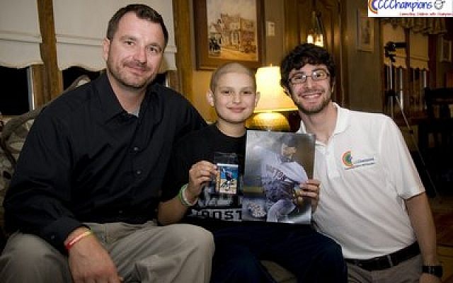 Former Boston Red Sox pitcher Brian Rose (left), with 11-year-old Jacob, a Red Sox fan, and Sidney Kushner. Front page: Jim Rooker, former pitcher for the 1979 World Champion Pittsburgh Pirates (left), with Kushner and 11-year-old Brett, an area cancer patient. (Sidney Kushner photo)
