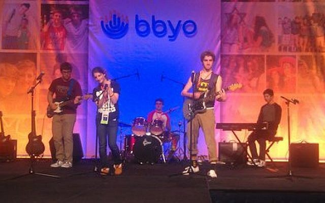 Daniel Keitel of Squirrel Hill, regional gadol for Keystone Mountain Region, sings lead in a rock band that performed at the just-concluded BBYO convention in Washington. The other band members, from around the country, are Ben Shepard, Scott Merritt, Brad Honigberg, Nora Stolzman and Alex Jerome. (KMR photo)