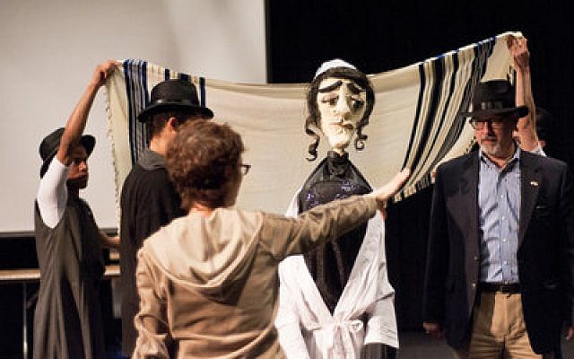 Choreographer Joan Wagman orchestrates a dance routine with her performers, including Leon Zionts, on right,  during a rehearsal for “The Dybbuk” at the Hillman Center for the Performing Arts. The “bridegroom” puppet is played by 10-year-old Celia Cangiano. (Chronicle photo by Ohad Cadji)