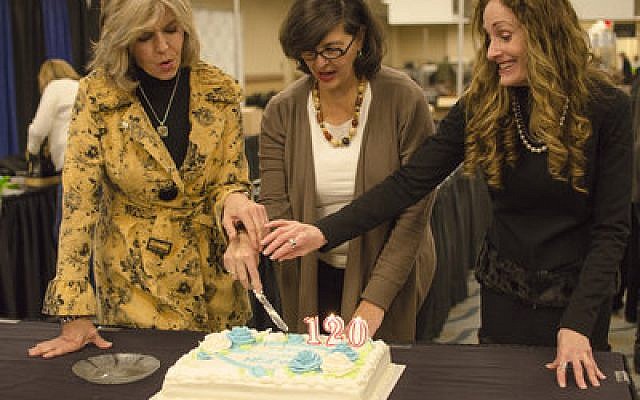 NCJW members cut the cake in celebration of their 120th birthday during the 43rd annual NCJW Designer Days sale. (Photos courtesy of NCJW)
 