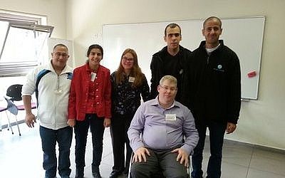 Standing from left to right, at the second annual Israel Self-Advocacy Conference in Jerusalem, are Asaf Buzaglo, Avital Ohayun, Simona Idan, Shai Asuline and Dudu Cheftzadi. Sitting is Yoav Kreim, a well-known leader and spokesperson for people with disabilities in Israel for more than 20 years. (Credit: Courtesy of the Ruderman Family Foundation)