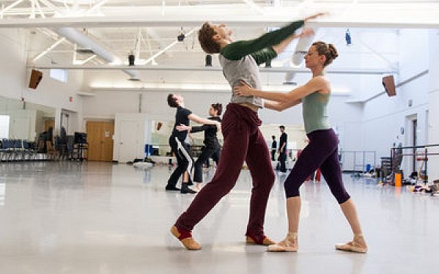 Pittsburgh Ballet Theatre dancers Alexandra Kochis and Nicholas Coppula, who portray the bride and bridegroom in “Ketubah,” rehearse for the upcoming opening of the ballet. (Chronicle photo by Lindsay Dill)