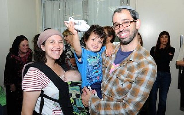 The Rubin family is all smiles at JFK International Airport before leaving for Israel. (Photo by Shahar Azran)