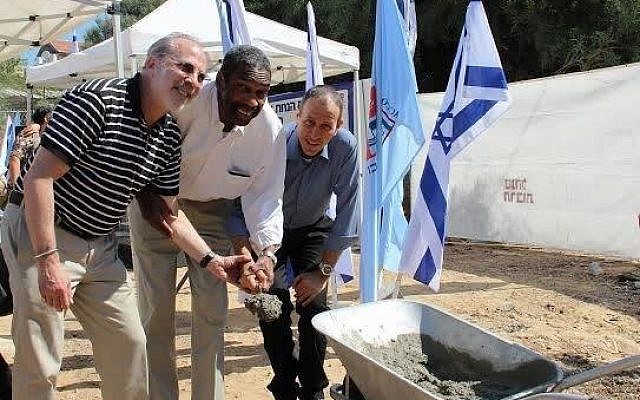 Mark Frank, Bill Strickland and Akko Mayor Shimon Lankri break ground on the new Northern Israel Center for Arts and Technology. (Photo provided)