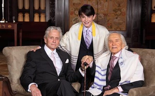 Kirk Douglas (right) with son Michael and grandson Dylan pose for a photo at Dylan’s bar mitzvah in May 2014. (Photo provided by Infinity Kornfeld Studios)