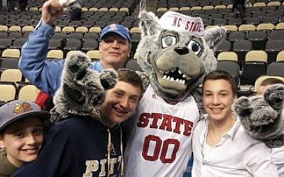 Jewish basketball fans get some attention from the North Carolina State mascot.