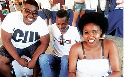 Ethiopian-Israeli Danny Ayanou (center) meets with students during a Confronting Apartheid event at the University of Cape Town in South Africa. (Photo by Danny Ayanou)