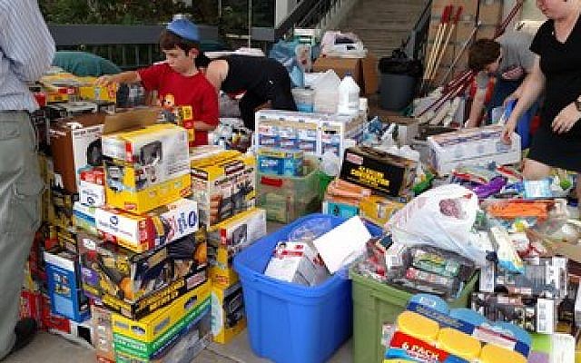 Volunteers at the Evelyn Rubenstein JCC were busy over the weekend handing out supplies to help in the recovery. (Photo provided by Jewish Federation of Greater Houston)