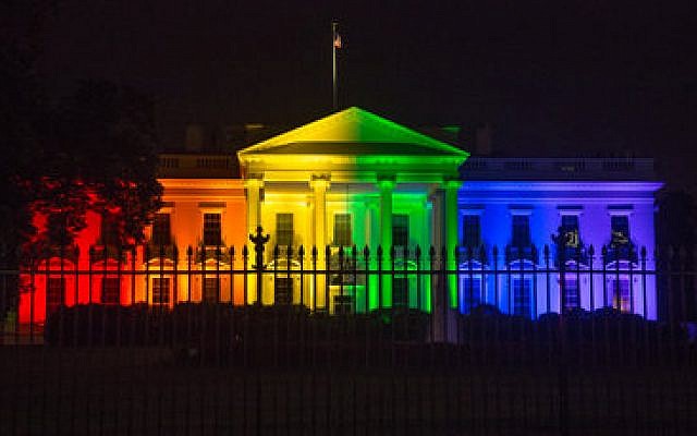 The White House is lit up in rainbow colors in recognition of the U.S. Supreme Court's ruling that legalized same-sex marriage nationwide. (Photo by Jeff Malet)