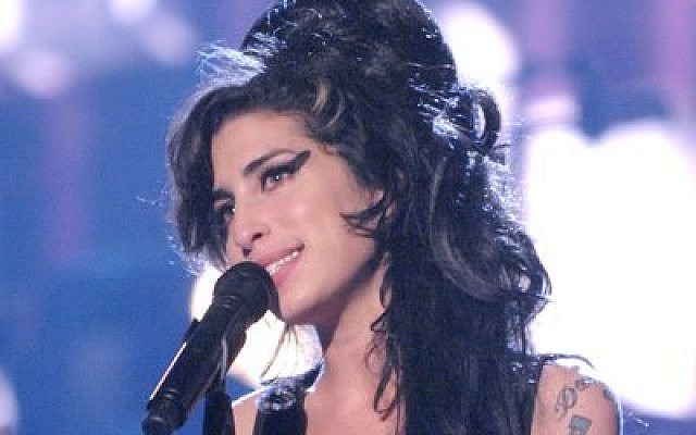 Amy Winehouse performs “Rehab” during the 2007 MTV Movie Awards at Gibson Amphitheater in Los Angeles. (Photo provided by JTA)