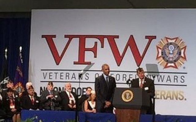 VFW National Commander John W. Stroud introduces President Barack Obama at the David L. Lawrence Convention Center. (Photo by Toby Tabachnick)