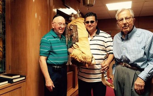 Kehilat Sfarad’s new Torah scroll is a gift from Beth Israel Congregation in Latrobe. From left: Mickey Radman, Shimon Ohayon and Abraham Anouchi. (Photo provided by Shimon Ohayon)