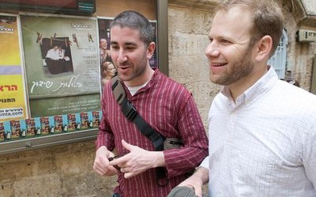 Michael Solomonov and Steven Cook talk about recipes and food while walking through the streets of Israel. (Photo provided by Zahav) 