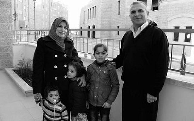 The family of Basim Dodin and his wife, Asma, are among the first Palestinian residents of Rawabi.