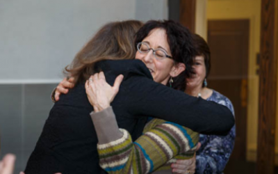 Eileen Freedman (right) is congratulated by CDS head of school Avi Baran Munro. (Photo courtesy of Community Day School)