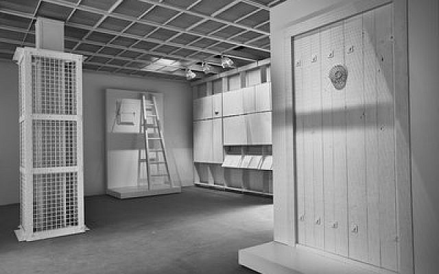 The interior of “The Evidence Room” at the Venice Architecture Biennale, with models of an Auschwitz gas column, a gas-tight hatch and a gas-tight door. (Fred Hunsberger)