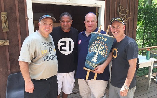 From left: Bobby Harris, Roberto Clemente Jr., Lenny Silberman and Jeff Solomon, who all traveled to EKC to impart the lessons of Roberto Clemente. 
 
Photo courtesy of Lenny Silberman