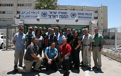 Georgia police officers taking part in the GILEE program pose in front of Israeli Police headquarters. 
Photo courtesy of Georgia State University