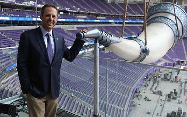 Mark Wilf, a co-owner of the Minnesota Vikings, at the team’s gigantic Nordic horn in its new $1.1 billion stadium. 
Photo by Hillel Kuttler
