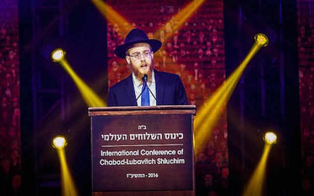 Rabbi Mendel Alperowitz addresses attendees of the International Conference of Chabad-Lubavitch Emissaries last week. 	Photo by Eliyahu Parypa/Chabad.org 