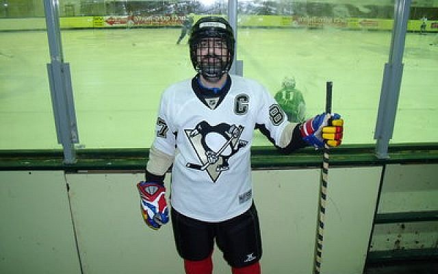 Steve Berman takes his hockey gear and stick wherever he travels. Here, he gets ready to play in Israel.
Photo courtesy of Steve Berman