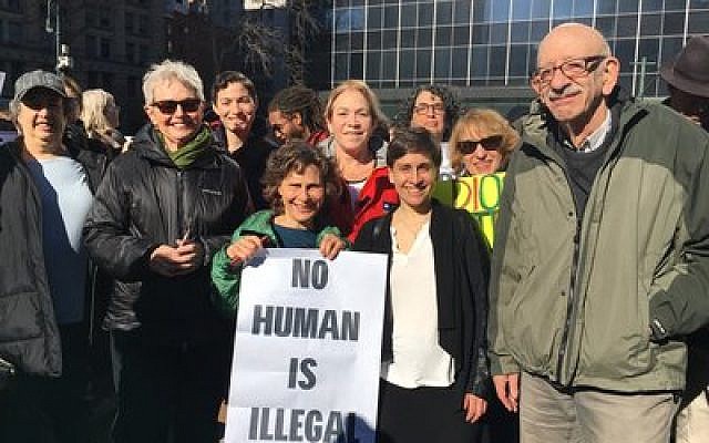 Congregants of B’nai Jeshurun in New York City rally on behalf of immigrants last week. B’nai Jeshurun is one of several synagogues more assertively embracing activism since Donald Trump’s election. 	Photo courtesy of B’nai Jeshurun