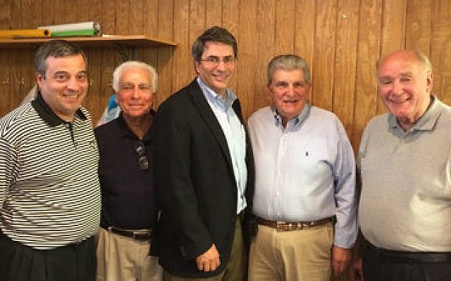 From left: Kiwanis members David Masters, Martin Grodin, David Maretsky and Robert McMurray. Dan Brandeis, director of the Jewish Community Foundation, is in the center.

(Photo courtesy of David Maretsky)