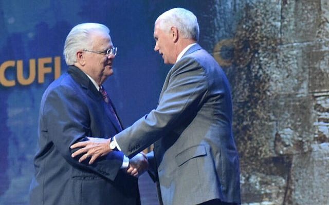 Pastor John Hagee, founder of Christians United for Israel, shakes hands with Vice President Mike Pence at CUFI’s annual conference in July. 
(Photo by Kasim Hafeez/CUFI)