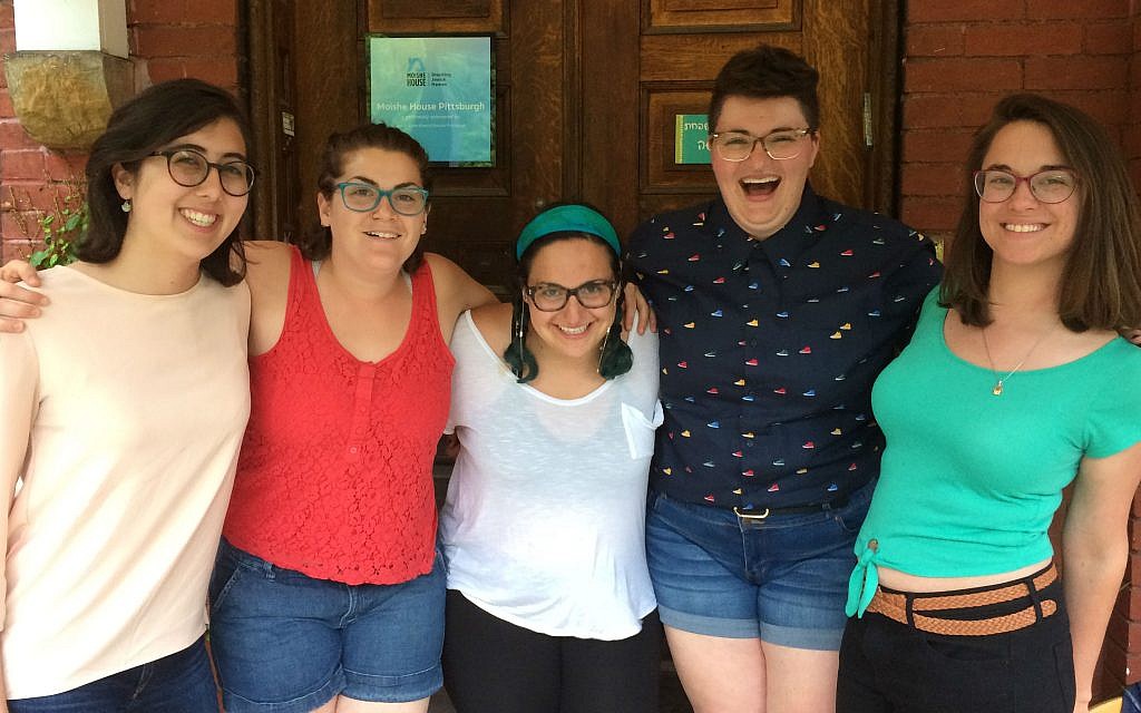 Moishe House is a network of some 58 houses scattered throughout the United States offering programs geared to Jewish millennials. Pictured, Pittsburgh residents Becca Michelson, Rose Eilenberg, Jessica Savitz, Carly Chernomorets and Dafna Bliss are all smiles as they pose for a photo. (Photo by Toby Tabachnick)