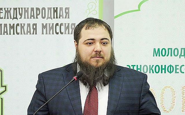 Mosei Yunayev speaks at the International Islamic Mission Forum in Makhachkala, Russia, in March.  
(Photo courtesy of the International Islamic Mission)