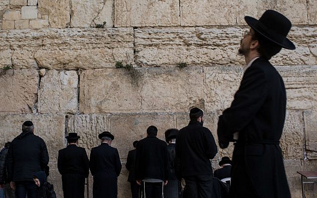 Haredi Orthodox men pray at the Western Wall in Jerusalem. (Photo by Chris McGrath/Getty Images)
