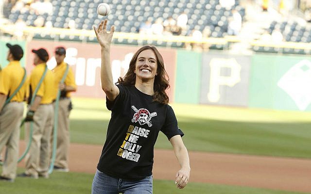 At Jewish Heritage Night at PNC Park on Aug. 8, the first pitch was thrown by Sheila Snyder; Adam Snyder was the catcher. 

Photo by Dave Arrigo