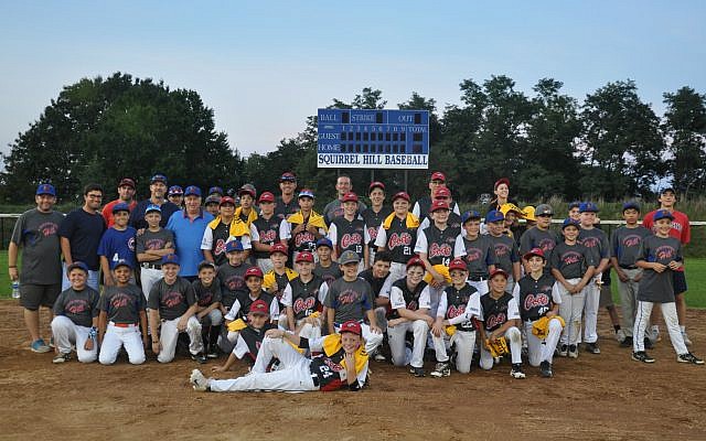 Players pose for a photo after an exhibition game between members of the Perth Heat Colts and the all-stars of Squirrel Hill baseball teams.	



Photo by Adam Reinherz