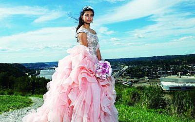 A photo from the exhibit with the caption: "Helen's Quinceañera, Mount Washington, 2017. Quinceañera is an important Latin American coming of age on a girl's 15th birthday. (Photo by Nate Guidry)