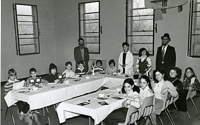 Children from the former Soviet Union celebrate a model seder with teachers from Hillel Academy in 1979. Andrew Silow-Carroll argues Jewish organizations may need to pivot to assist Ukraine Jews, as they did in the former-Soviet Union.   (Photo provided by Heinz History Center)