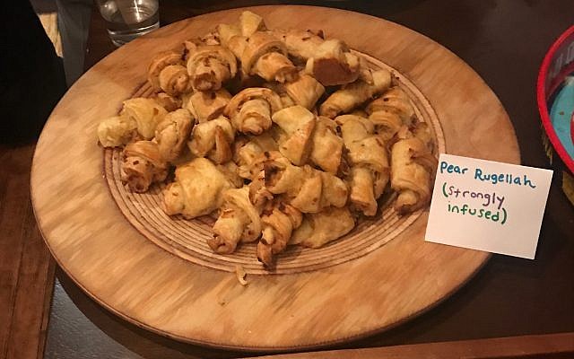 Cannabis-infused Jewish delicacies, of various levels of potency, get top billing at a Brooklyn Chai Havdalah event. (Photo by Lucy Cohen Blatter/ JTA)