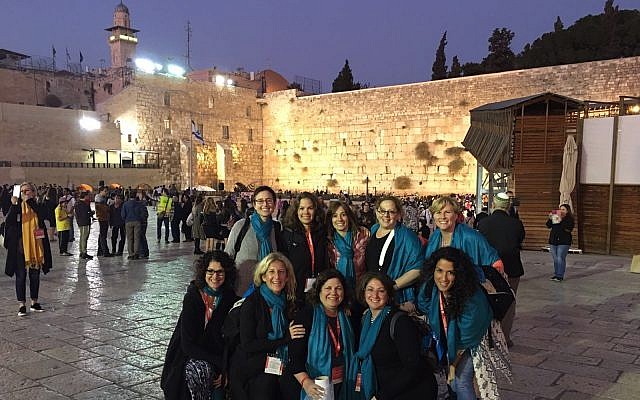 Pittsburgh's participants are all smiles as they pose for a group photo at the Western Wall. (Photo courtesy of Adrienne Indianer)