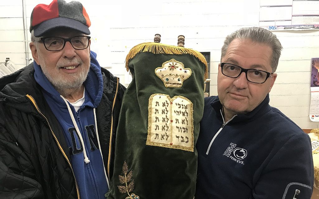 Temple Hadar Israel religious chairman Art Epstein, left, and President Sam Bernstine prepare to ship a Torah to Houston when the synagogue closes in 2017. (Photo courtesy of Sam Bernstine) Temple Hadar Israel religious chairman Art Epstein, left, and President Sam Bernstine prepare to ship a Torah to Houston when the synagogue closes in 2017. (Photo courtesy of Sam Bernstine)