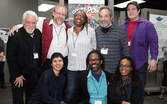 A group shot of the creators behind “CHUTZ-POW! Volume III.” Top row, from left: Mark Zingarelli, Wayne Wise, Deesha Philyaw, Howard Bender and Vince Dorse; bottom row, from left: Rachel Masilamani, Marcel Walker and Yona Harvey. Not pictured: Loran Skinkis. (Photo by Melanie Friend)