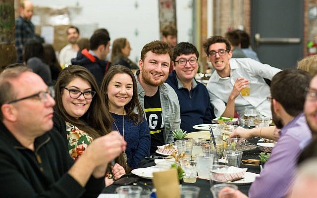 Seventy-five people participated in the OneTable launch. These diners had a lot to smile about. (Photo by Lovas Photography and Design)