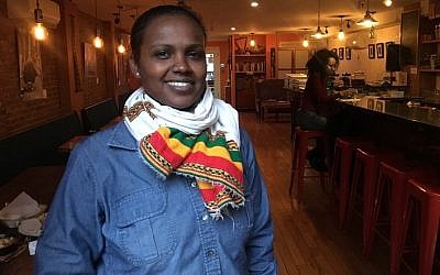 Beejhy Barhany and her husband, Padmore John, celebrate Ethiopian, Israeli and American cultures through their food at Tsion Cafe. (Photo by Josefin Dolsten)