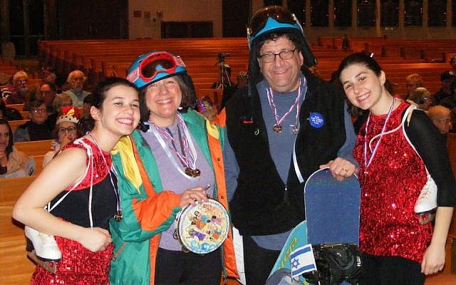 New Light Congregation’s Rabbi Jonathan Perlman and Beth Kissileff with their daughters Yael and Ada. (Photo by Barry Werber)